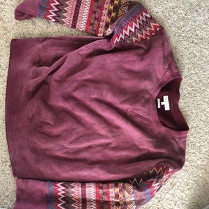 Red pull over with patterned long sleeves